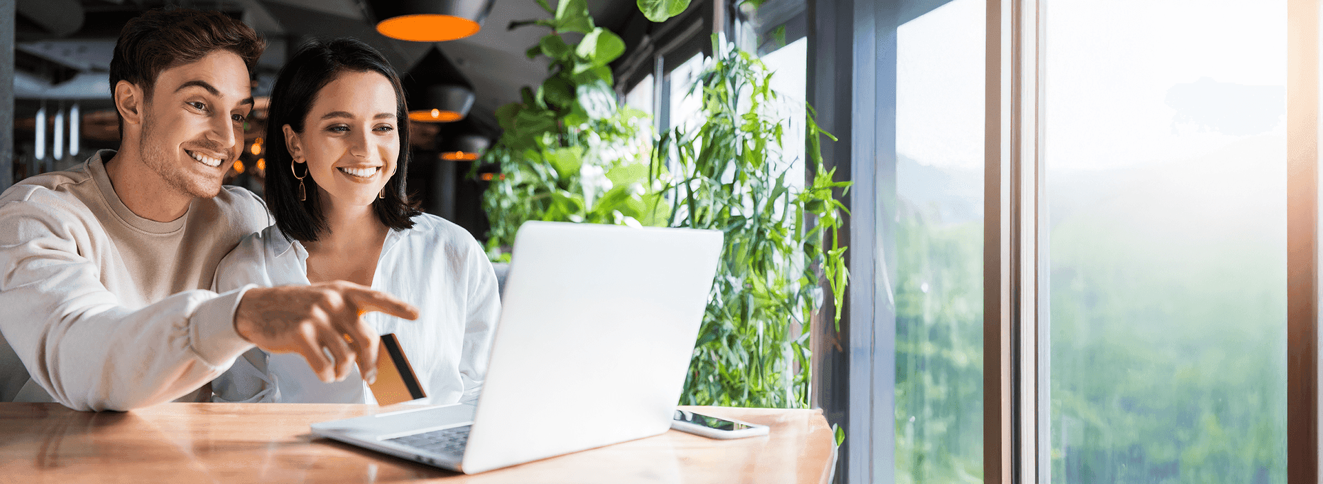 People discussing with laptop